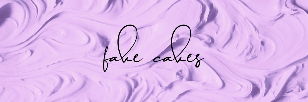 a background of purple icing with the words "fake cakes" on top